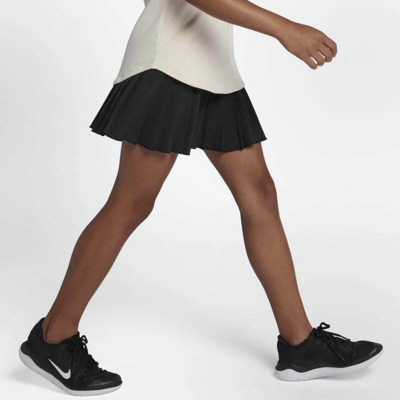 Черная юбка в школу. Юбка теннисная Nike Victory для девочек. Теннисные юбки в школу для девочек. Теннисная юбка черная. Школьная юбка теннисная для девочек.