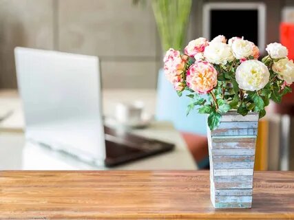 The vase is on the table