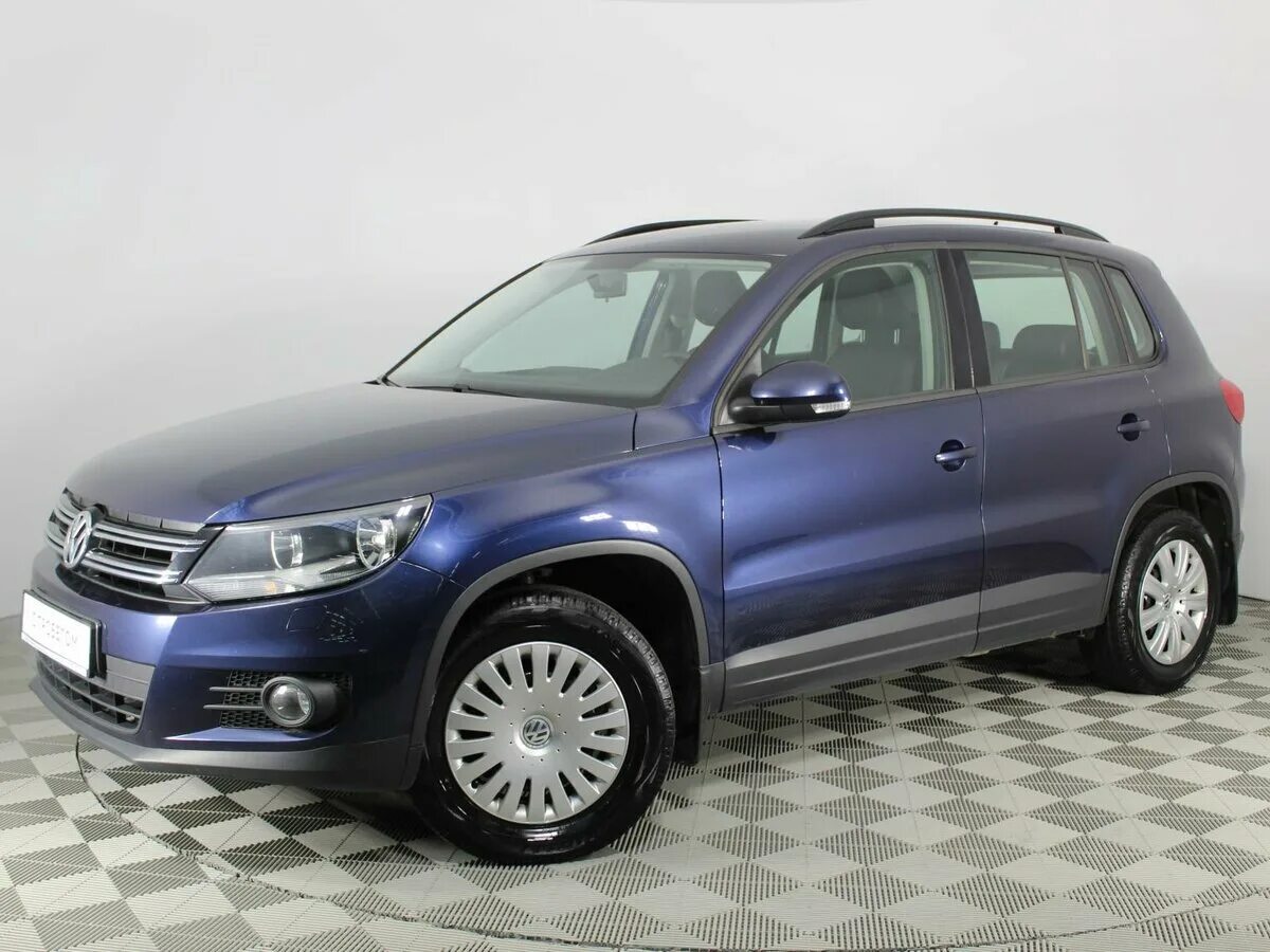 Volkswagen tiguan 2014. Фольксваген Тигуан 2014. Tiguan 1. Volkswagen Tiguan 1 Рестайлинг. Volkswagen Тигуан 2014.