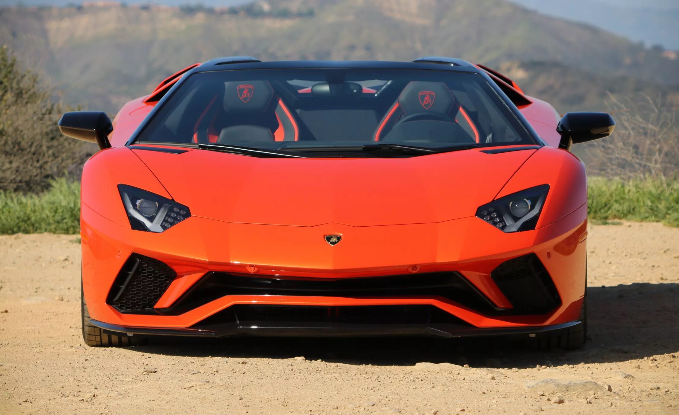 Ламборджини авентадор 2015. Lamborghini aventador lp750-4 sv roadster 2016. Lamborghini aventador 2014 анфас. Lamborghini huracan evo. Ламборгини спереди.
