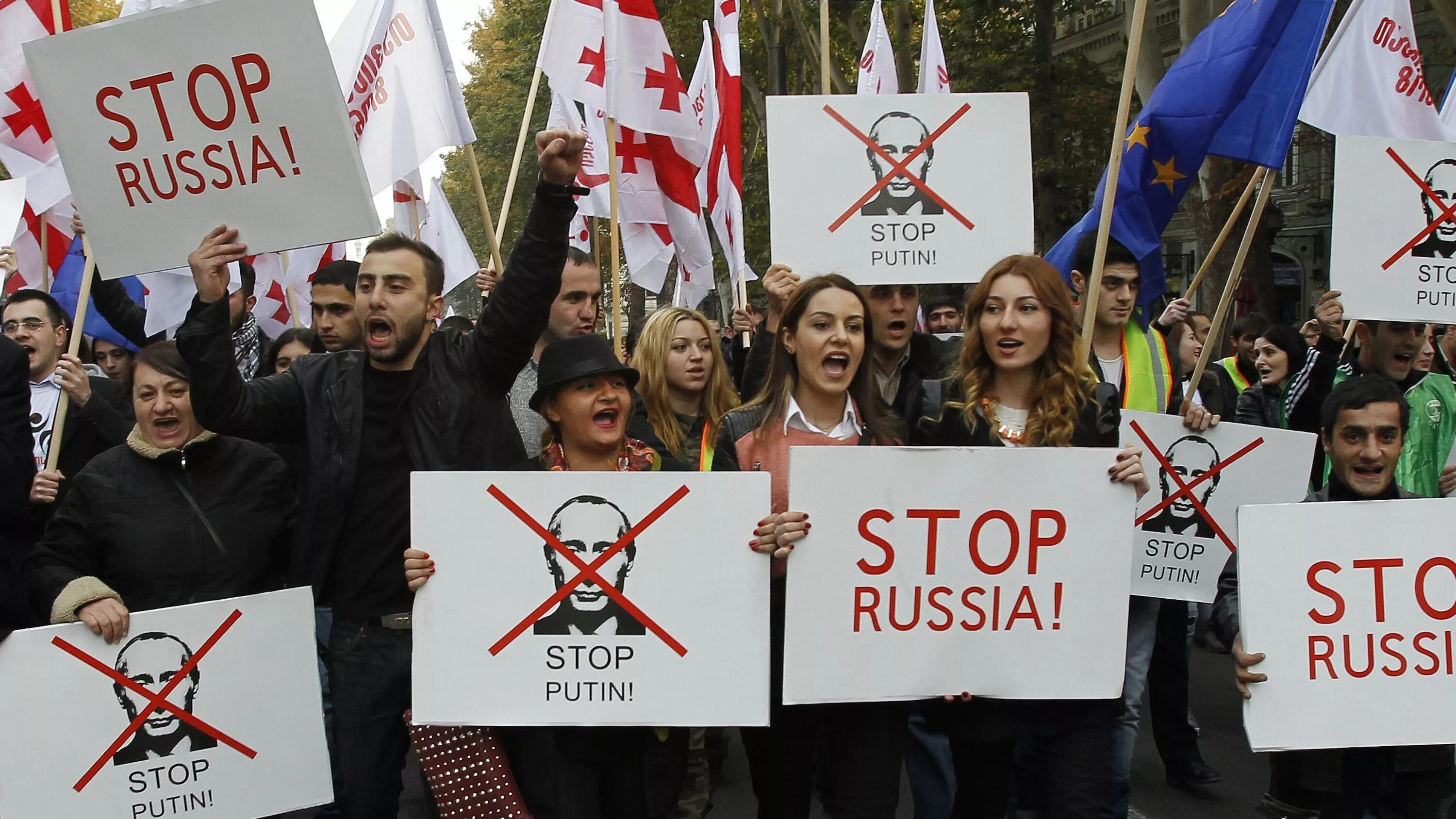 Антироссийские плакаты в Грузии. Грузины против России. Плакаты Грузия против Россия. Русофобские плакаты в Грузии.