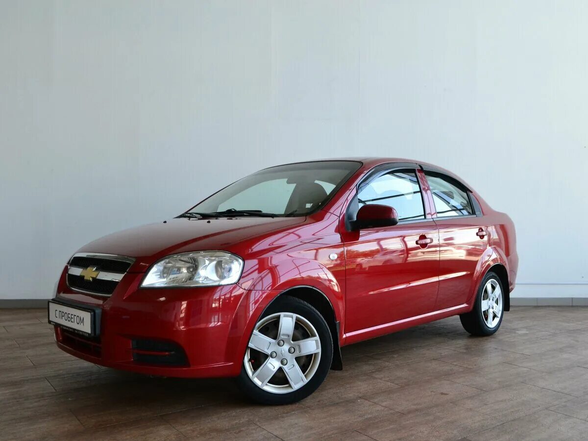 Купить шевроле авео т 250. Chevrolet Aveo t250 красный. Шевроле Авео седан 2011. Chevrolet Aveo 2011 красный. Chevrolet Aveo 2011 1.4.