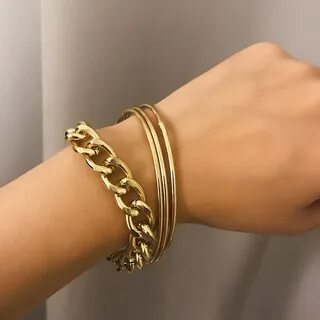 Массивные золотые браслеты женские