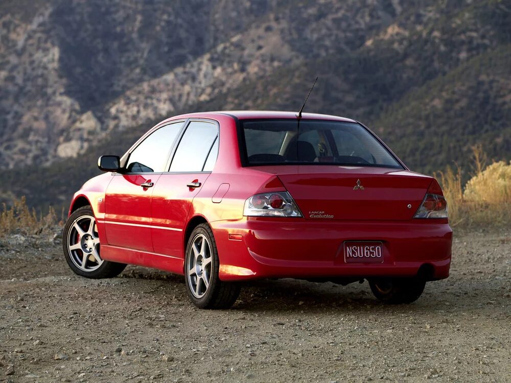 Mitsubishi lancer кузова. Митсубиси Лансер Эволюшн 2003. Mitsubishi Lancer EVO 2004. Мицубиси ланцер 2004. Mitsubishi Evolution 2004.