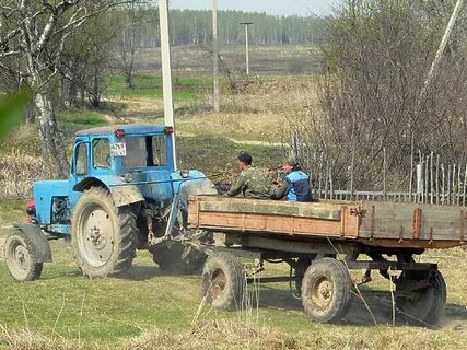 Работа трактора с прицепом