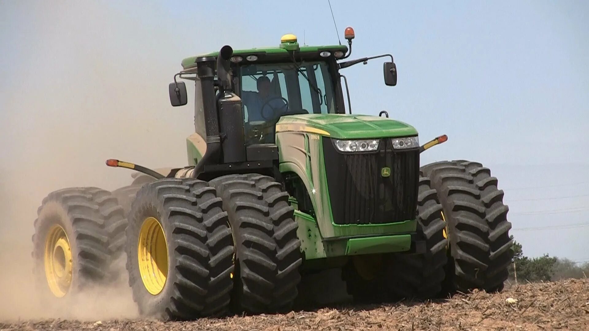 Как называется большой трактор. Трактор john deere 9420. трактор джон дир 9560. колесные трактора джон дир. john deere самый большой трактор.