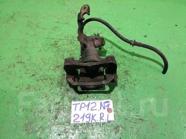 Суппорт Nissan Primera P12 УНИВЕРСАЛ QG18DE 2006 задний левый (б/у)