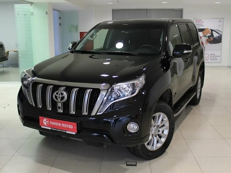 Toyota land cruiser prado 2014 черный. Тойота ленд крузер прадо на дроме. Ленд крузер 150 белый. Тойота ленд крузер прадо на дроме. Прадик 2011.