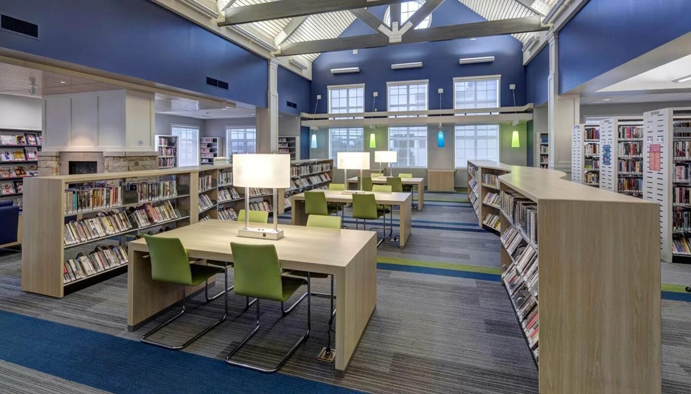School library. Читальный зал МФТИ. Современная библиотека. Современный читальный зал. Интерьер современной библиотеки.