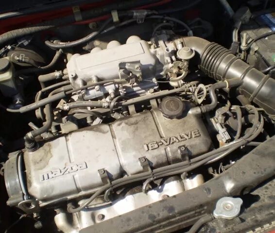 Мазда 323 v6. Мазда 323 мотор 1. Двигатель мазда 323 b3 me. Двигатель 1. Мазда 323 z5 de бронепровода.