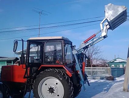 Задний погрузчик на трактор