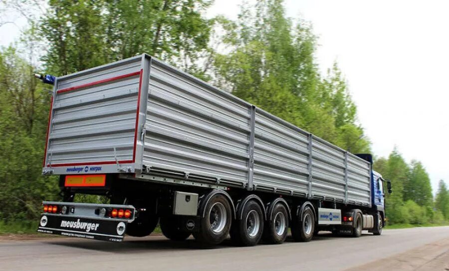 прицеп новтрак 4 оси. 4 осный самосвальный полуприцеп. 4 х осные. тонар 652803. 4 х осные.