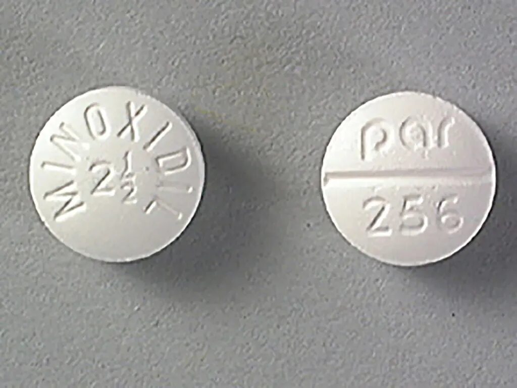 Таблетки 2 5 мг. Minoxidil Tablets. Таблетка 50 мг. Блистер 1 2 таблетки. 50 Мг фото.