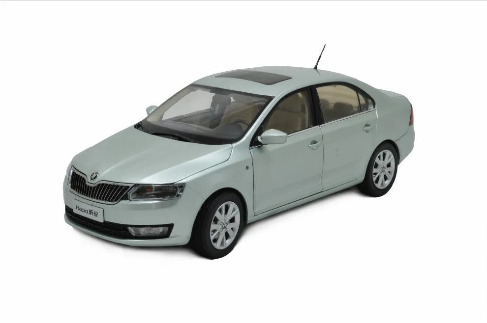 Rapid model. Skoda octavia 1/24 welly. skoda rapid модель игрушечная. моделька шкода рапид. škoda rapid игрушка технопарк.