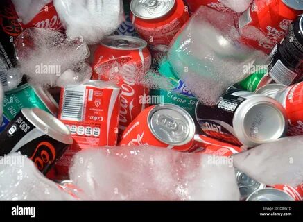 Tins of cold drinks or soda cans in ice water Stock Photo - Alamy 