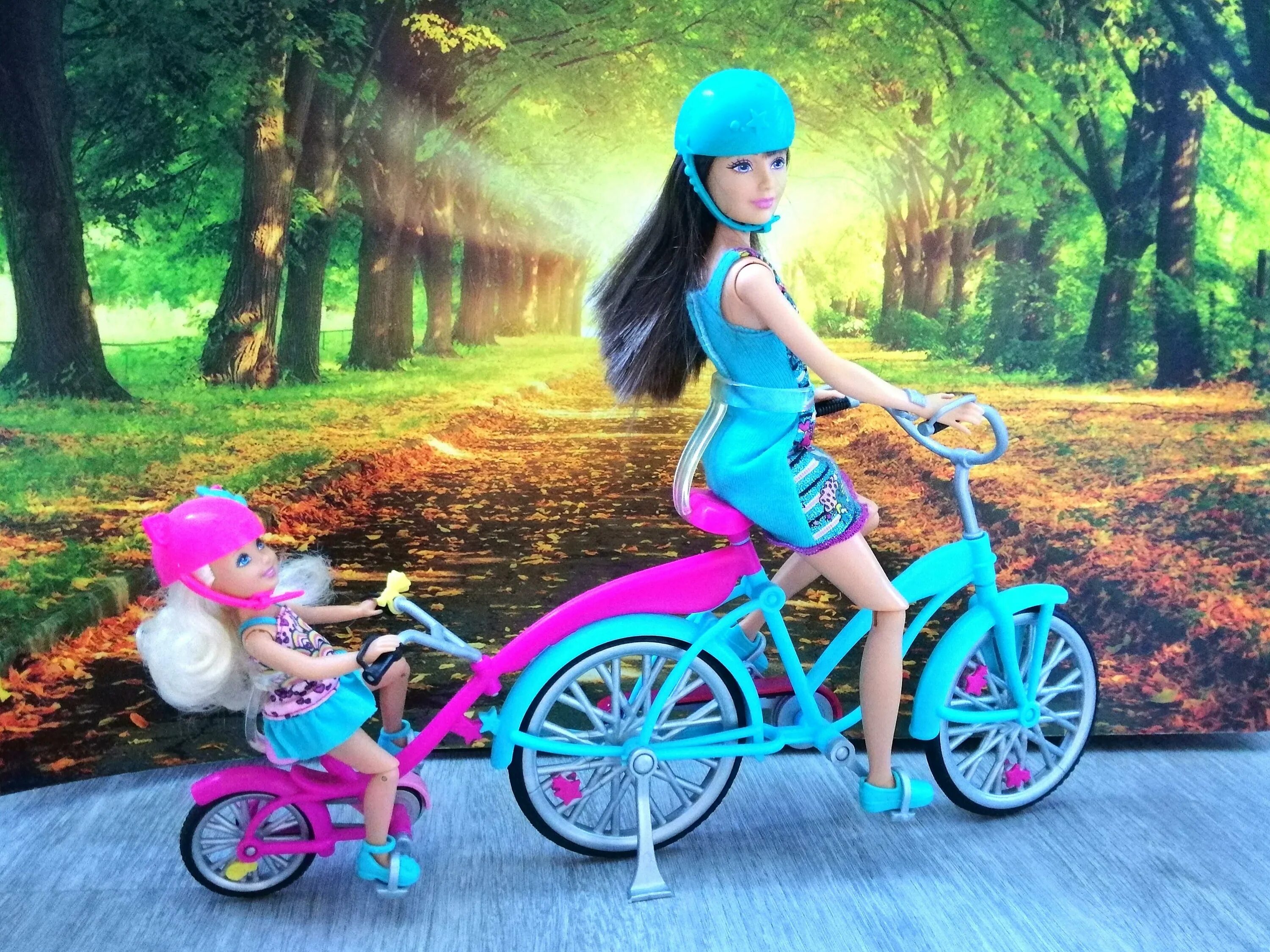 Барби на велосипеде. Велосипед Барби розовый.