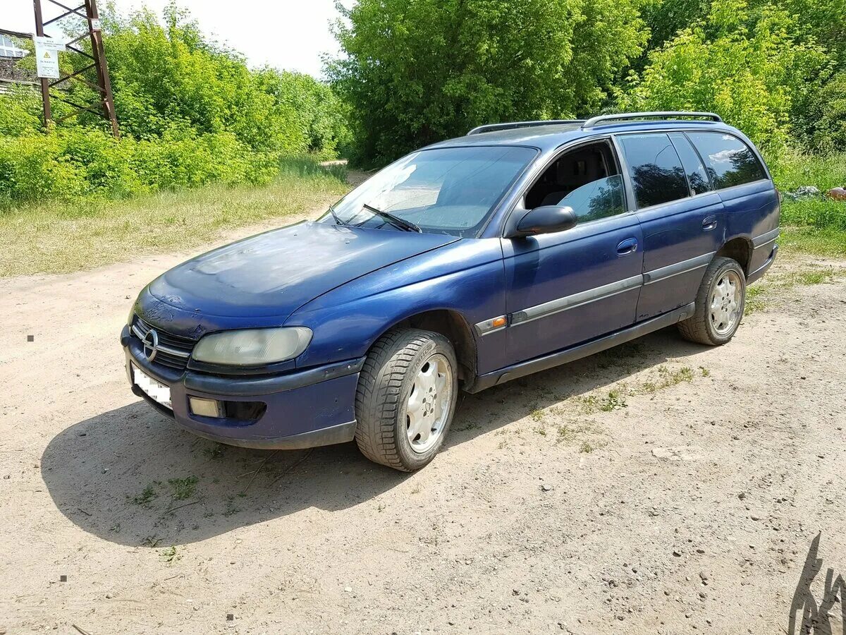 Куплю опель омега б универсал. Опель Омега 1995. Opel Omega 1995. Opel Omega универсал 1995. Опель Омега 1998.