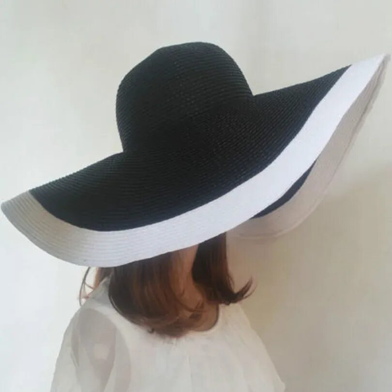 Широкополая шляпа женская черная. Шляпа с большими полями женская. Шляпа пляжная женская. Черная пляжная шляпа. Большие черные шляпы