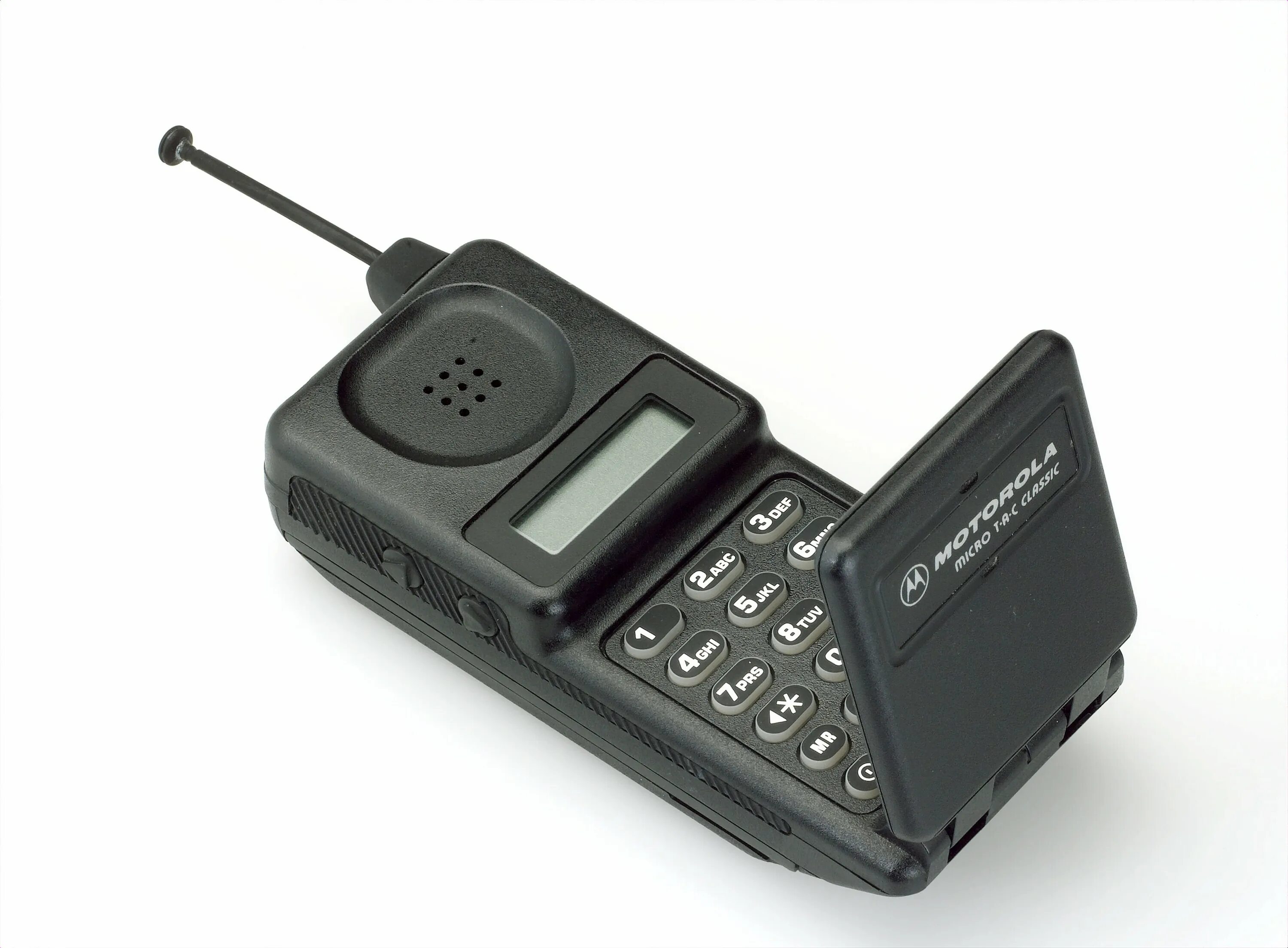 Компактный мобильный. Motorola MICROTAC 9800x. Моторола микротак 9800. Motorola MICROTAC 1989. Motorola MICROTAC Classic.