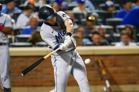 Miami Marlins' Garrett Cooper hits a two-run home run during the eight...