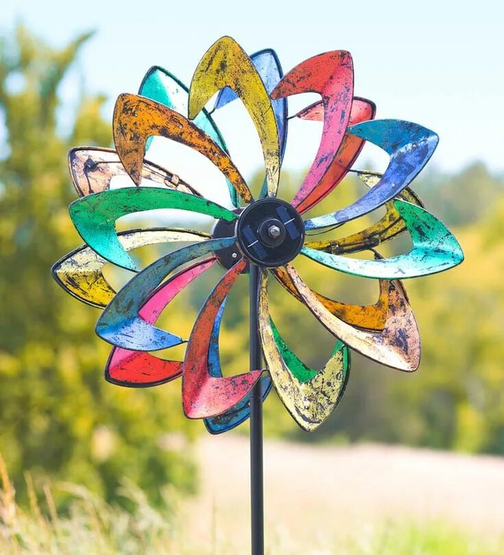 Металлические колеса фантастика. Spinning wind. Вертушек ветряной. Spinning wind. Ветровые вертушки.