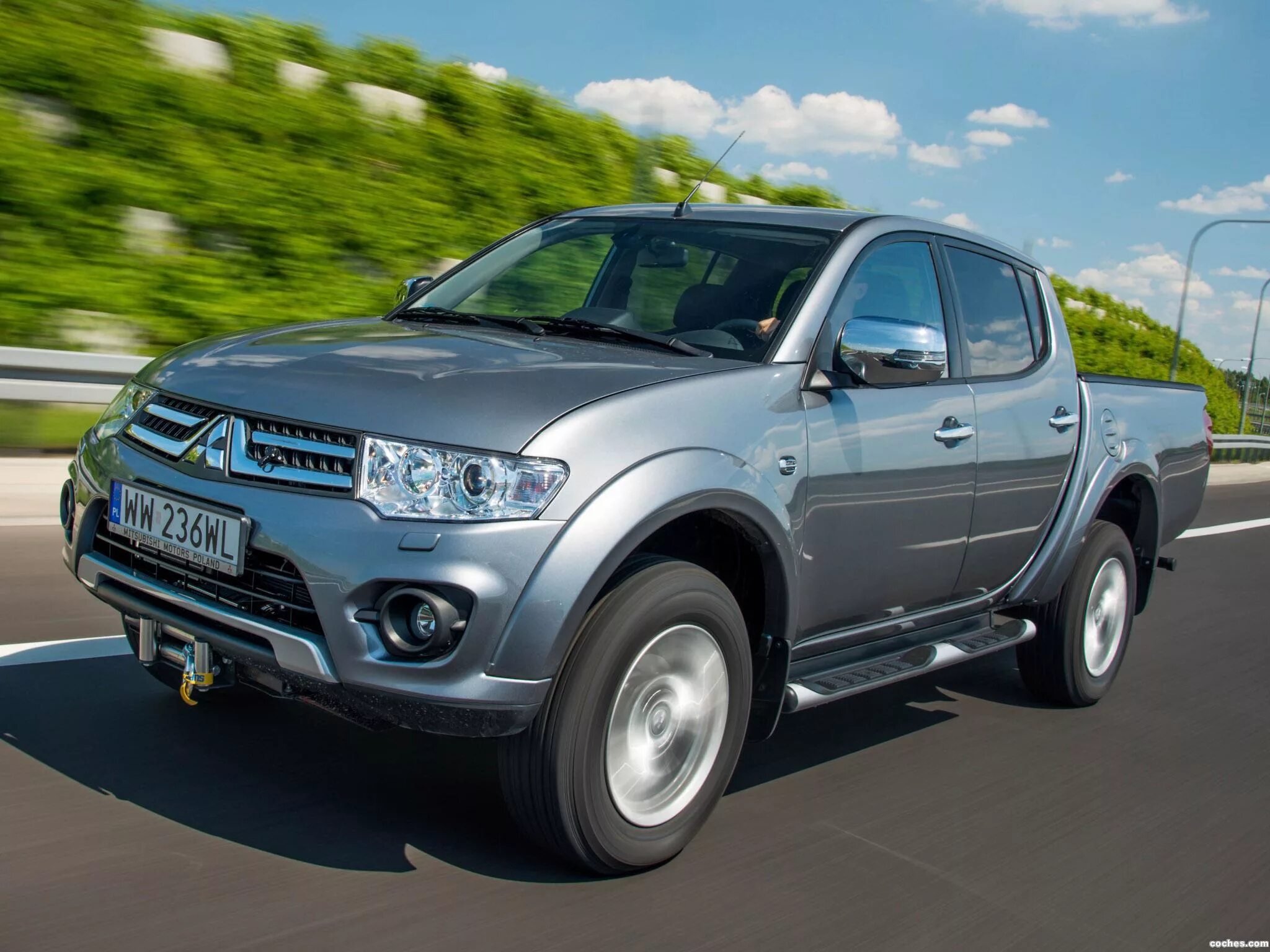 Купить мицубиси 2014. Mitsubishi l200 IV. Mitsubishi Pickup l200. Митсубиси l200 DHD. Mitsubishi l200 IV поколение.