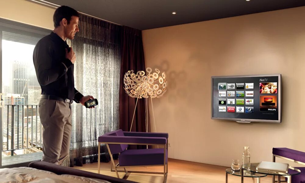 Телевизор в гостинице. Интерактивное Телевидение в гостинице. Телевизор в гостиничном номере. Система мультимедиа в гостиницах.
