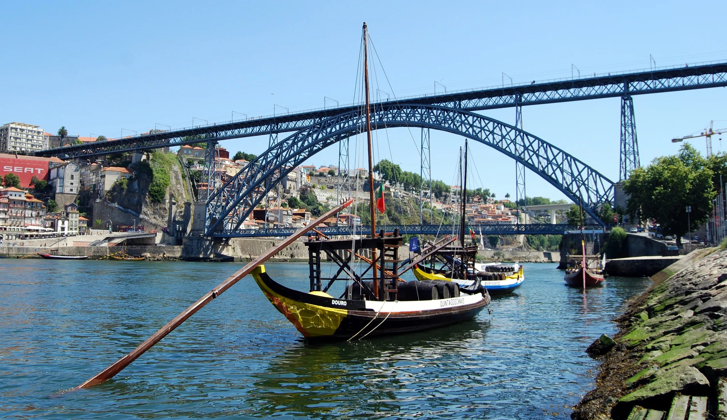 Город порту на реке. Португалия мост Луиша. Мост в Порто Португалия. Мост в оплрто( Португалия 1870е). Мост через реку Дору в Португалии.