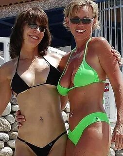 Wives in micro bikinis.