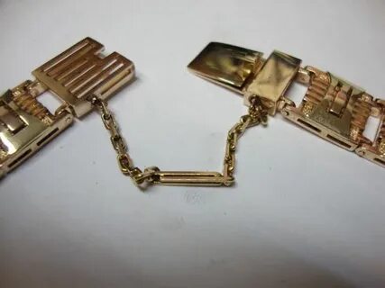 Застежка на золотых часах