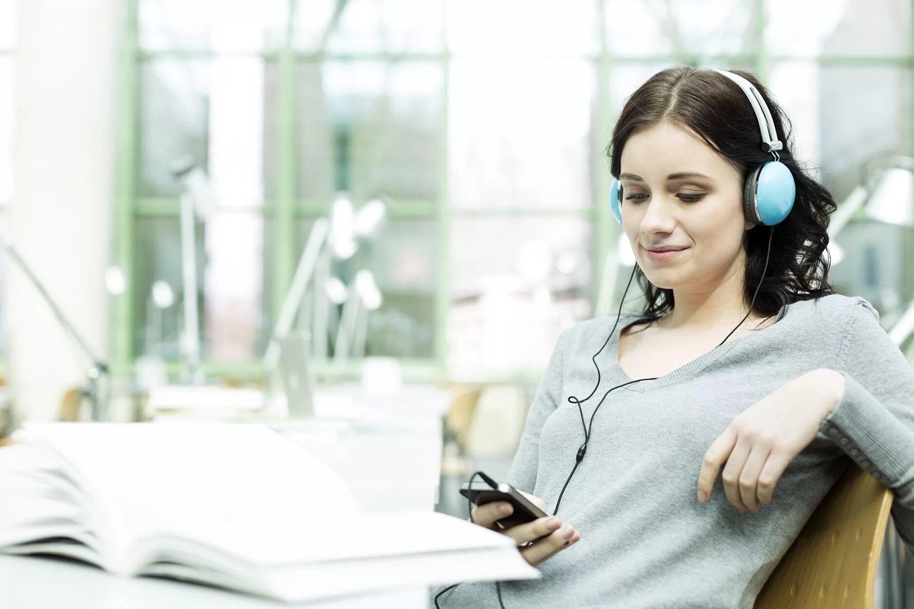 Listening to Music. People Listening to Music. Student with Headphones. Listen to the Music.