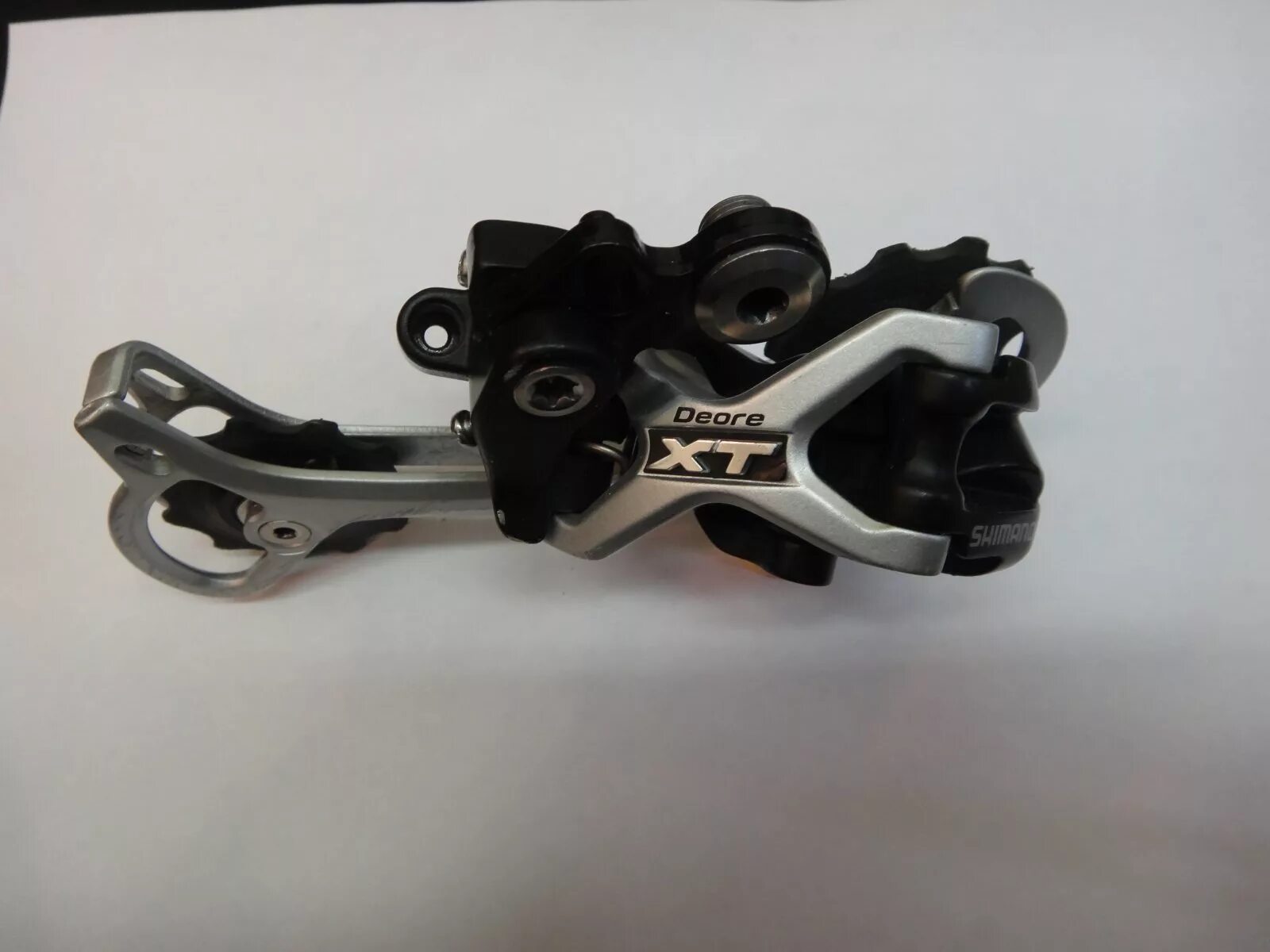 Переключатель шимано диор. Переключатель shimano deore xt. шимано диор xt. шимано диор хт задний переключатель.