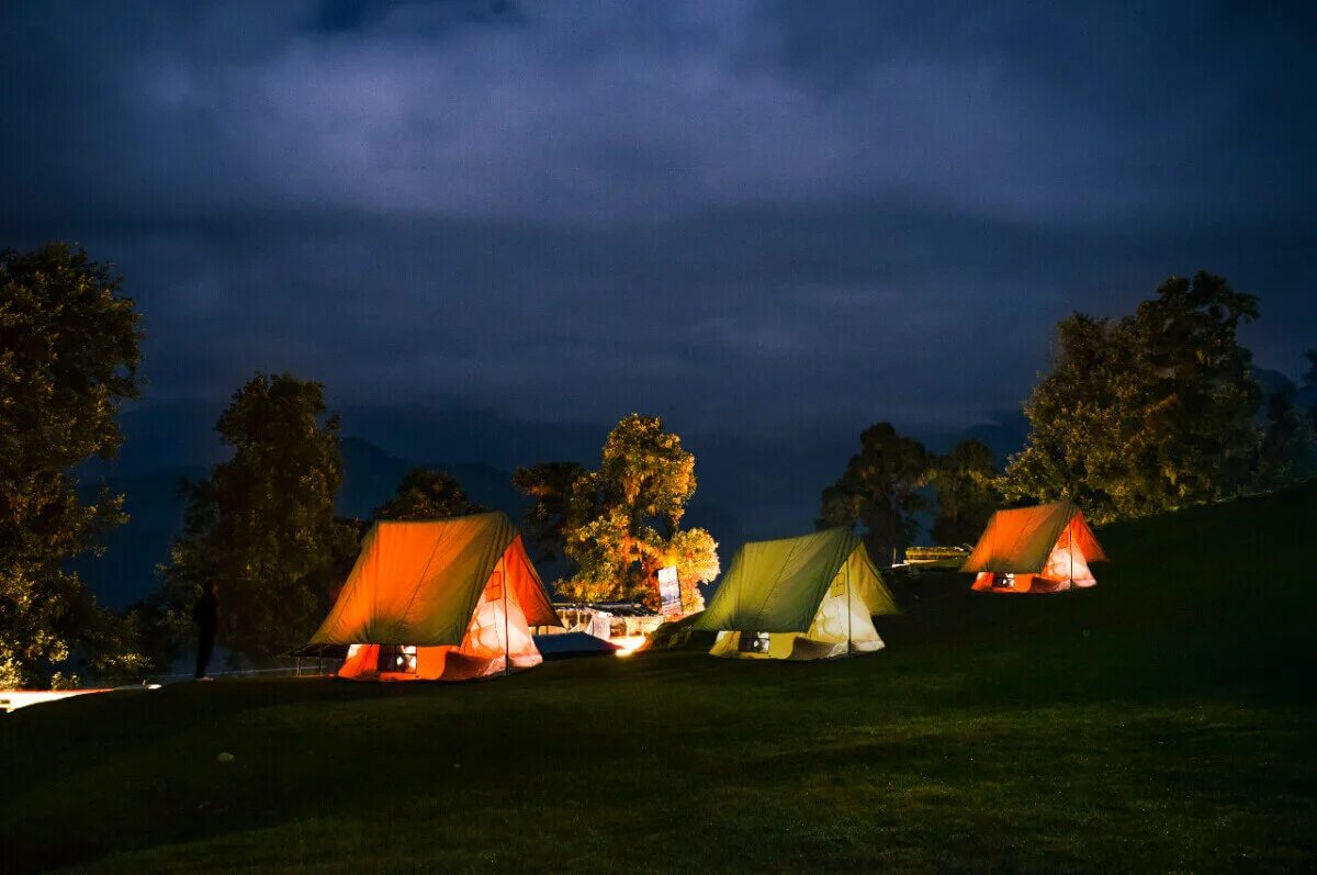 Camping out book. Halloween vacation destinations. Pitch a Tent on a Summer Night. Tourist camping