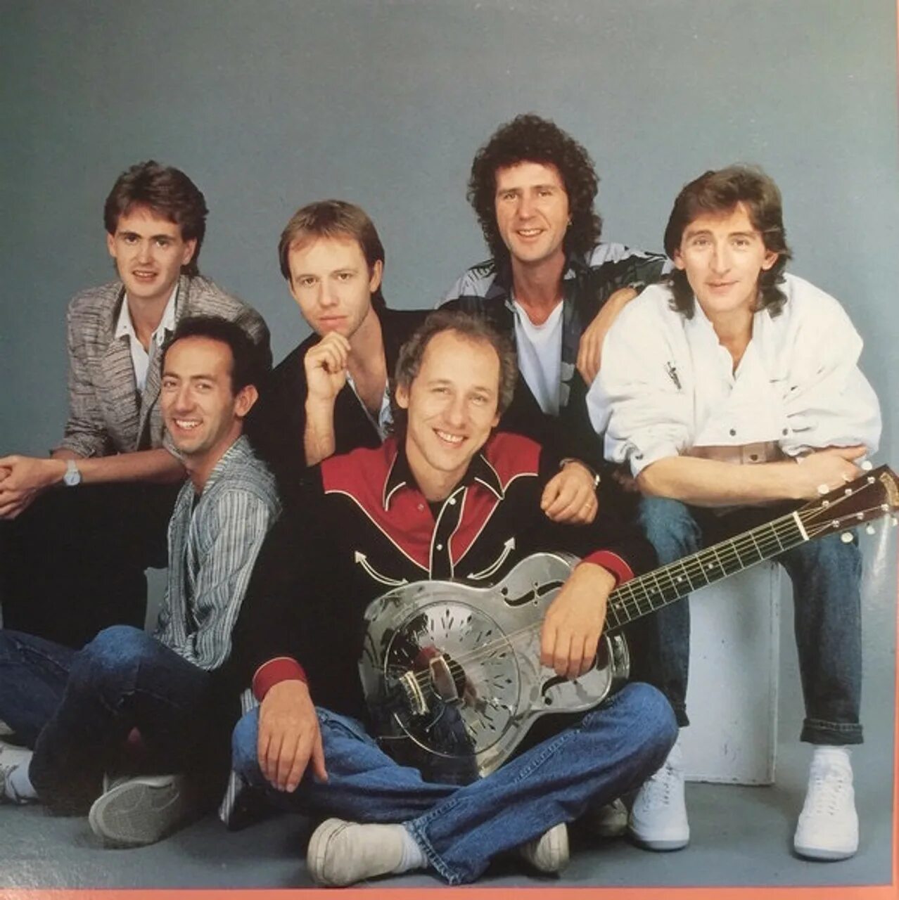 Даер стрейтс. Dire Straits. Dire Straits фото. Dire Straits исполнитель группа. Группа dire Straits 1991.