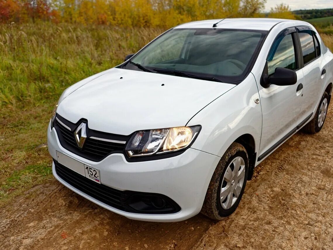 Купить рено бу нижний новгород. Рено Логан 2015. Renault Logan 2015. Logan 2015. Рено Логан 2015 год АКПП.