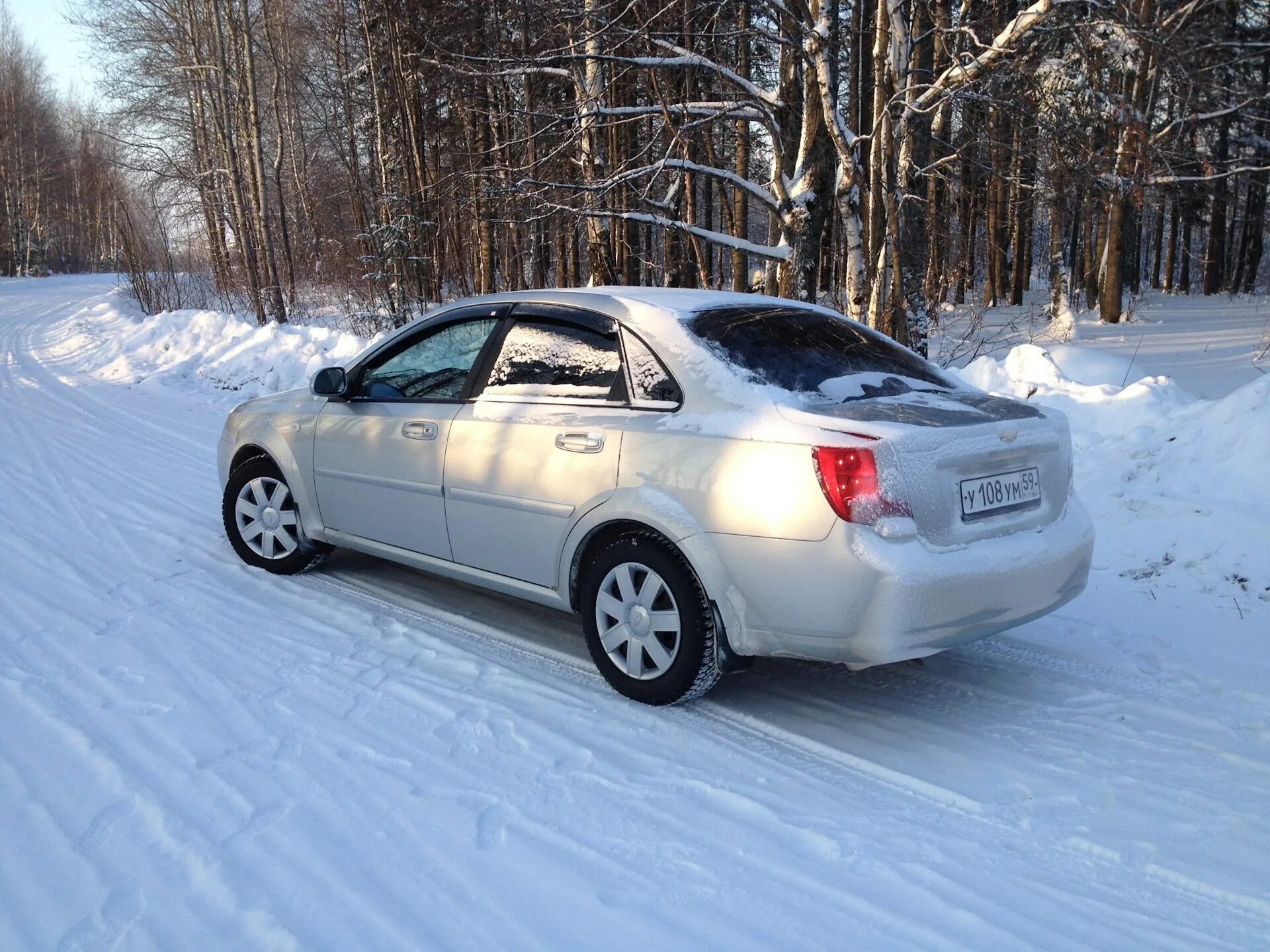 Chevrolet Lacetti 2010 серебристый. Chevrolet Lacetti 2010 седан. Chevrolet Lacetti 2008 зима. Шевроле Лачетти белый седан 2010.