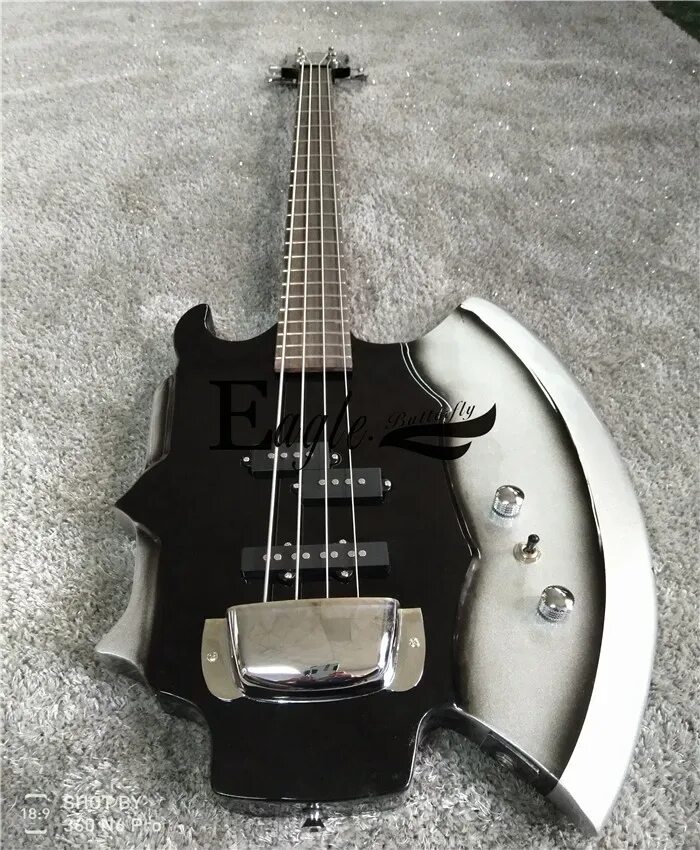 Электрогитара для металла. Бас-гитара Axe. Gene Simmons Bass Cort Axe. Металлическая гитара. Гитара для металла.