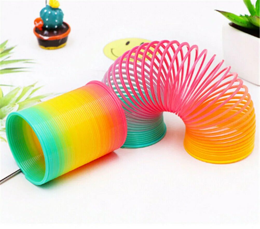 Как называется пружинка радуга. Слинки slinky пластик. пружинка слинки. слинки радуга. пружинка радуга.