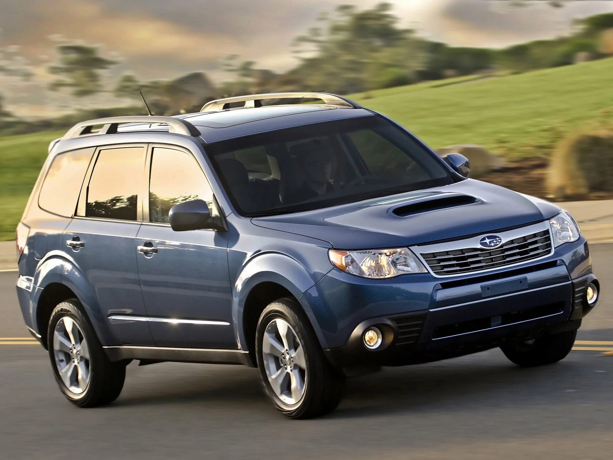 Субару форестер какие поколения. Subaru Forester 2010. Subaru Forester XT 2010. Subaru Forester 3. Subaru Форестер 2010.