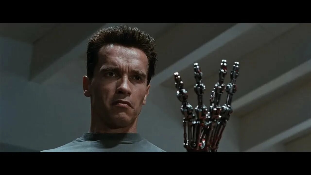 Терминатор фильм 1991 4. Арнольд шварценеггер в фильме терминатор 2. Арнольд шварценеггер терминатор 2 рука. Шварценеггер терминатор 2. Шварценеггер t1000.