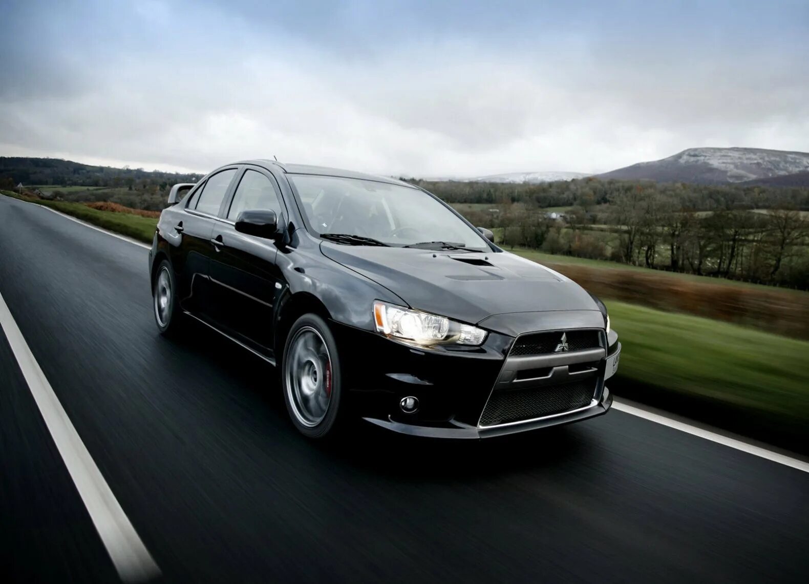 Mitsubishi lancer. Mitsubishi Lancer x. Митсубиси Эво 2008. Машина Мицубиси Лансер 10. Мицубиси Лансер Эво 10 черный.