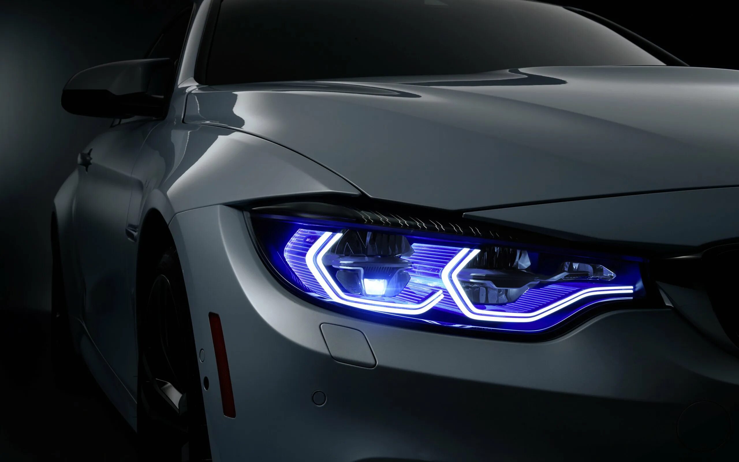 Фары черной машины. BMW m9. BMW m4 iconic Lights. Лазерные фары БМВ m4.