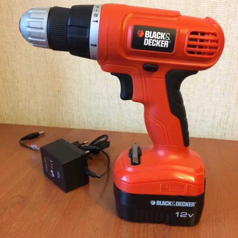 Купить шуруповерт в саратове. Шуруповёрт Black Decker 12v. Black and Decker шуруповерт 12 вольт. Шуруповерт Блэк энд Деккер 12в. Шуруповерт Блэк энд Деккер 18 вольт.