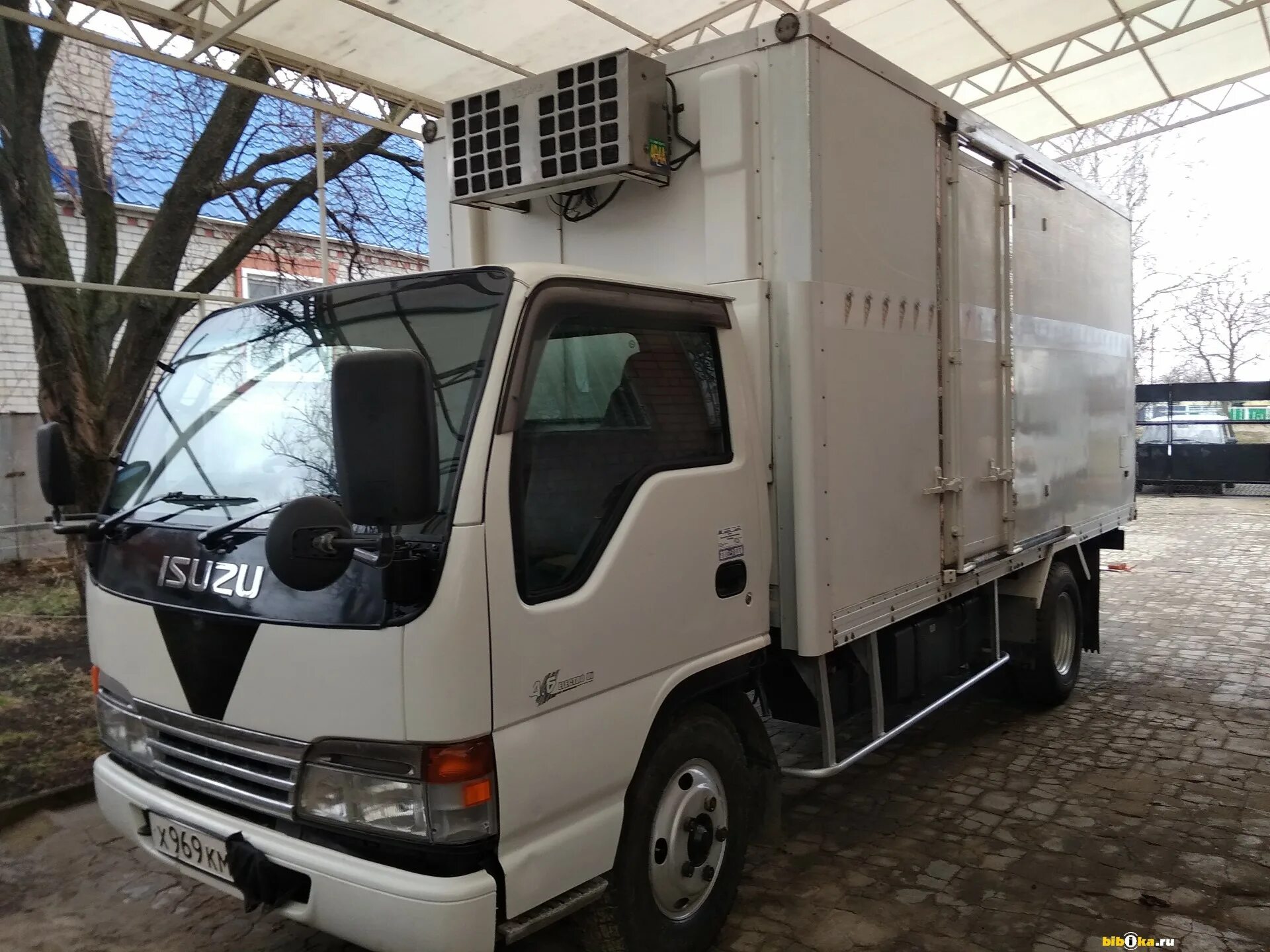 Исузу эльф рефрижератор. Isuzu Elf рефрижератор 2000. Исузу Эльф 2000 фургон рефрижератор. Isuzu рефрижератор 2000г.