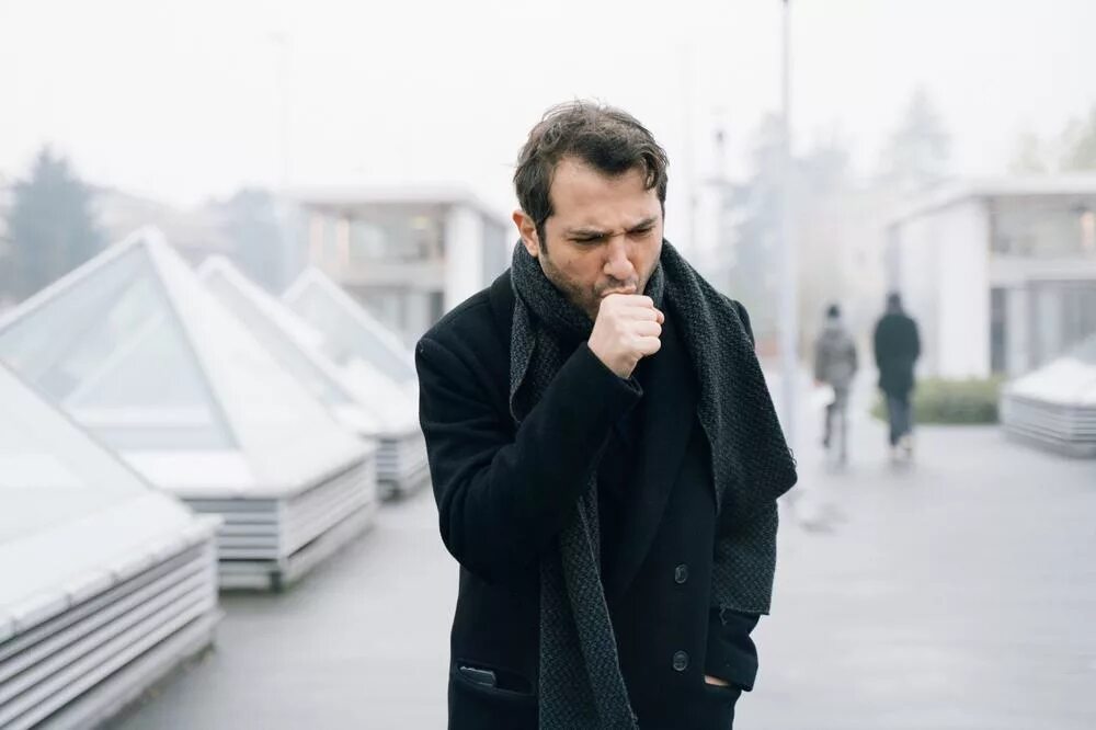 Зима грипп. Femalemuslim coughing in winter. Холодная зима. Человек кашляет. Шарф для детей.