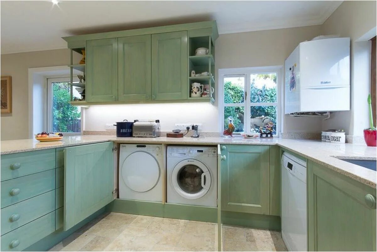 отдельностоящая стиральная машина на кухне. стиральная машина в интерьере кухни. кухня со встроенной стиральной машиной. стиральная машина на кухне. куня сос тиральной машиной.