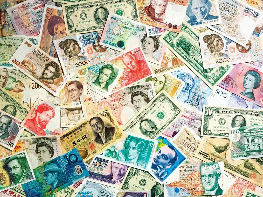 Денег в мире много. Деньги стран. Разные купюры. Денежный фон. Разные валюты.