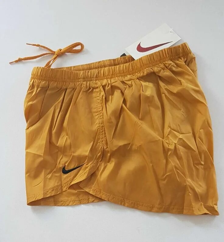 Nike Elite Running shorts. Золотые беговые шорты. Nike Gold шорты.