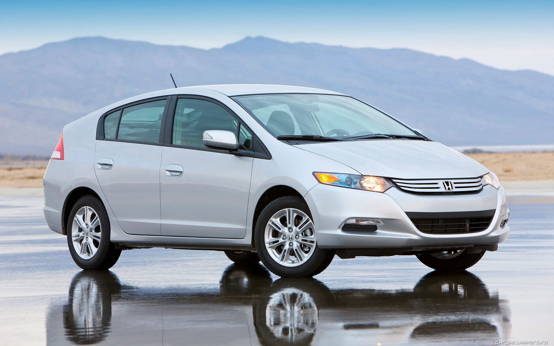 Инсайт 2010. Honda Insight 2010. Honda Insight 2009. Honda Insight 2014. Хонда Инсайт гибрид 2014.