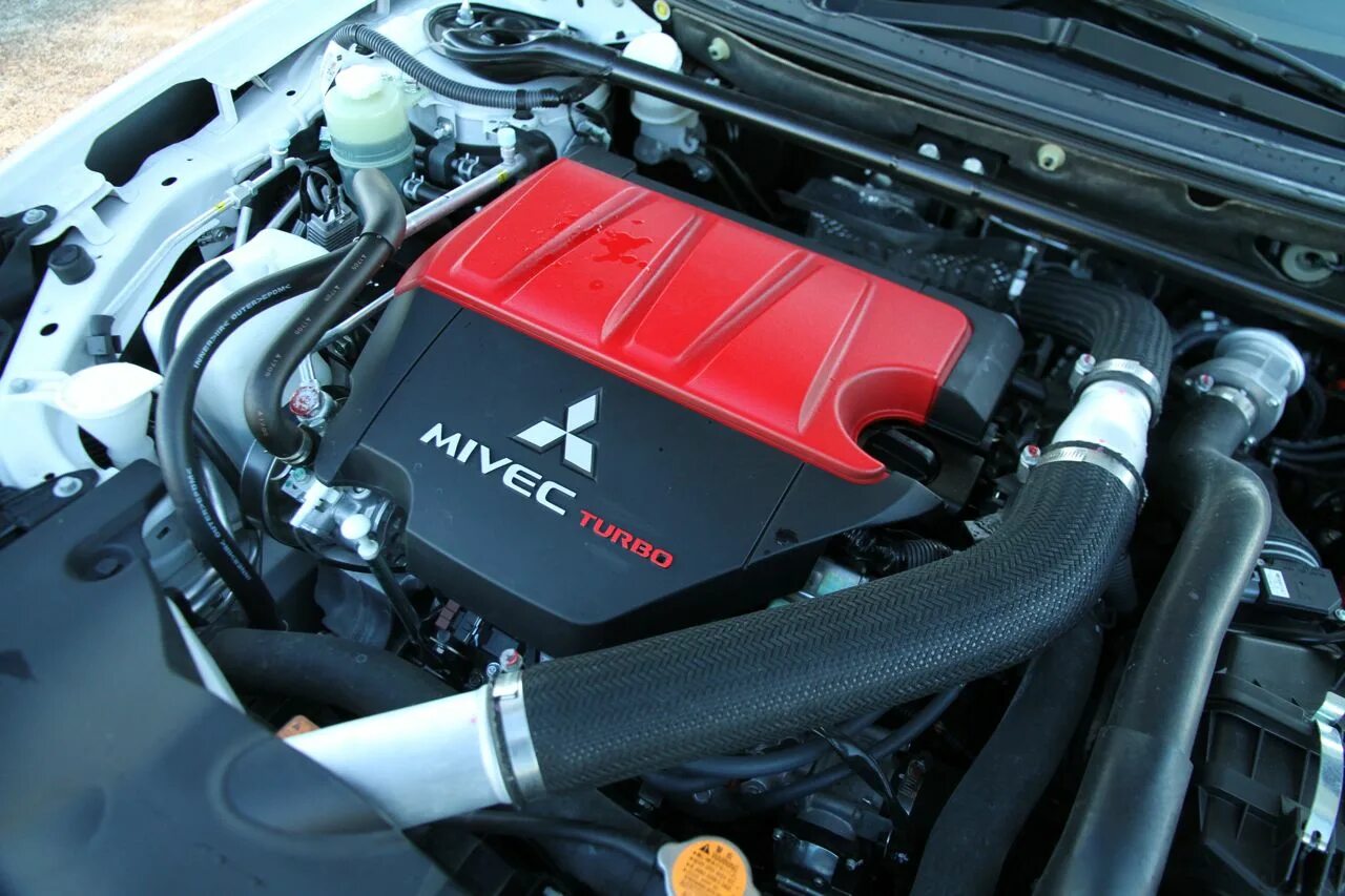 Мотор mitsubishi lancer. Двигатель Митсубиси Эволюшн 10. Мотор Mitsubishi Evolution 6. Лансер 10 Эволюшн двигатель. Mitsubishi Lancer Evolution 10 двигатель.